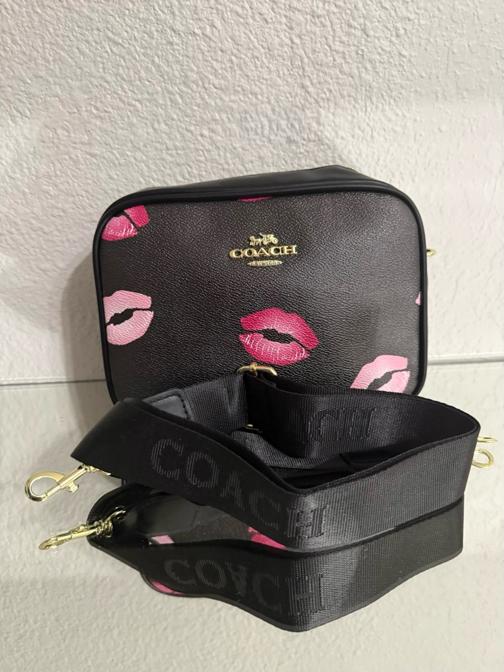Coach Black Pebbled Leather Crossbody with Pink Lip Motif